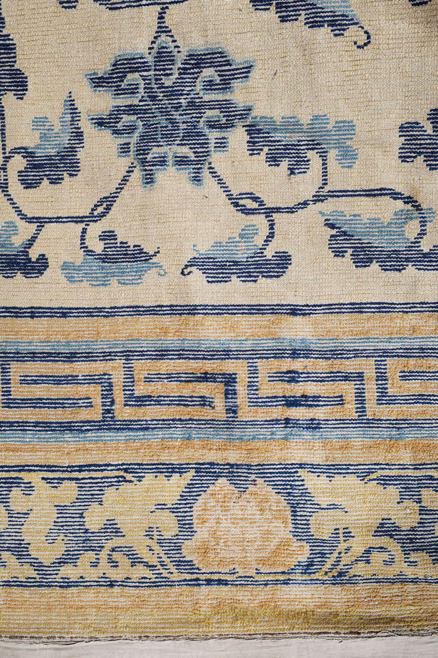 18th Century and Earlier Early Chinese Carpet with Stylized Lotus Flowers and Leaf Stems For Sale